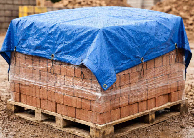 Tarpaulin Uses For Covering Bricks On A Construction Site